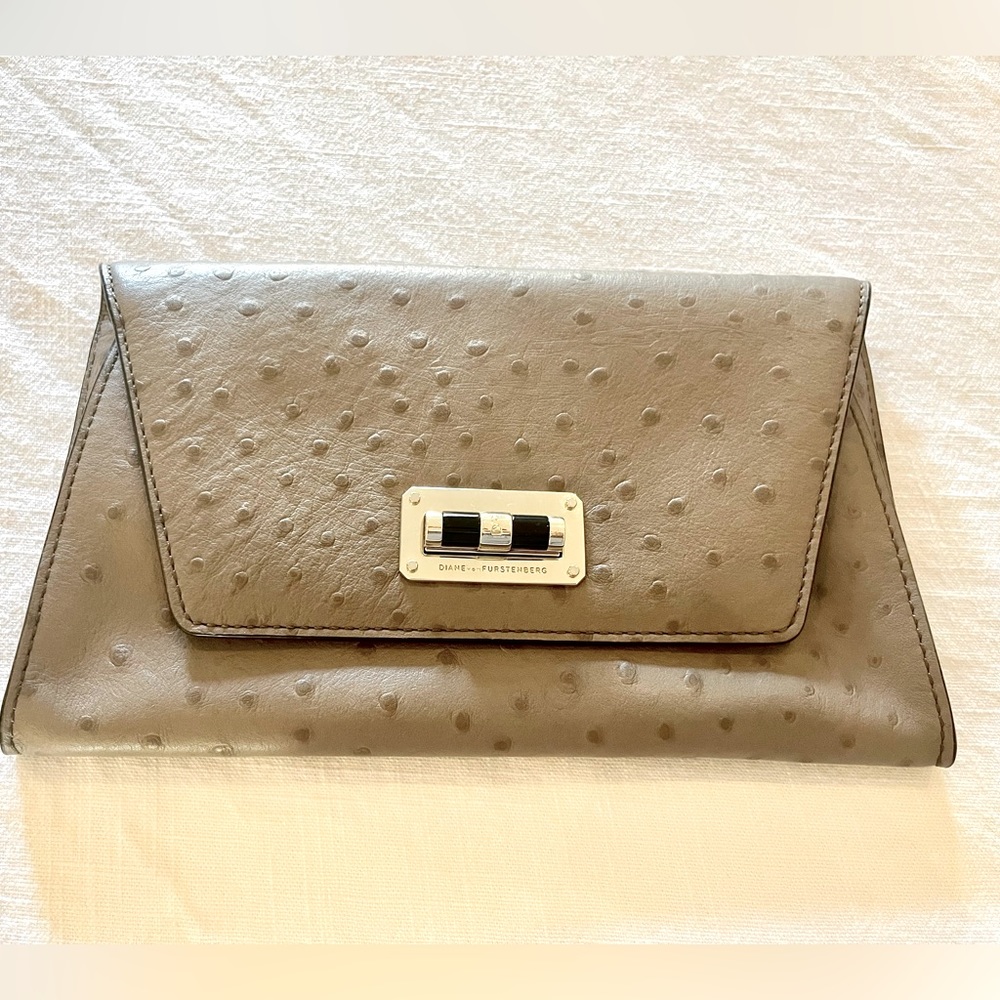 Tan detailed leather clutch bag by DIANEvonFURSTENBERG